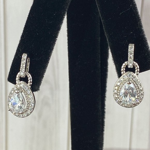 Natural 2/3CT Each D Color 7x5 MM Pear Cut White Sapphire Drop Earrings